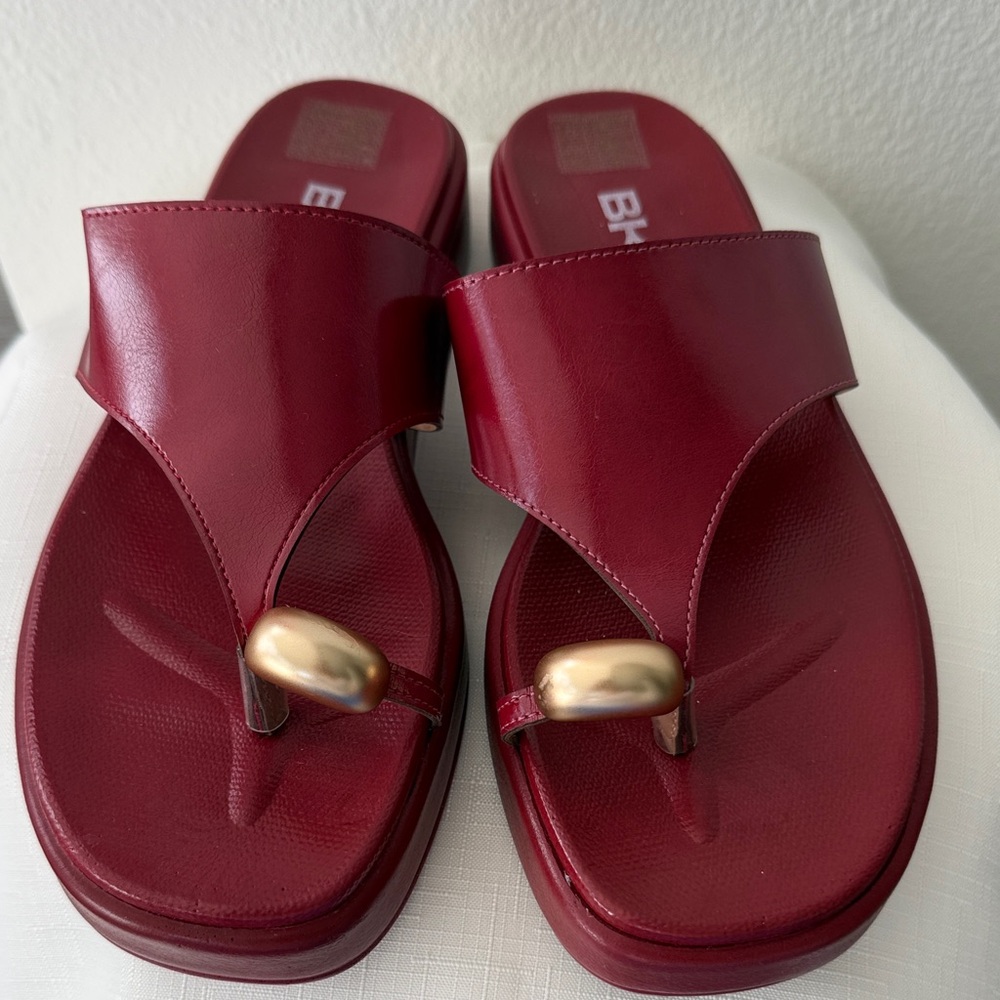 Elegant Red Sandals with Gold Accent